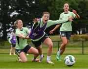 9 July 2024; Emily Murphy is tackled by Megan Connolly during a Republic of Ireland women's training session at the FAI National Training Centre in Abbotstown, Dublin. Photo by Stephen McCarthy/Sportsfile