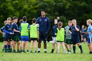 10 July 2024; Coach Sean Kelly Komolafe with participants at the Bank of Ireland Leinster Rugby summer camp at Greystones RFC in Wicklow. Photo by Matt Browne/Sportsfile