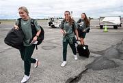 10 July 2024; Republic of Ireland players, from left, Izzy Atkinson, Abbie Larkin and Jess Ziu at Dublin Airport ahead of the team's departure for their 2025 UEFA Women's European Championship Qualifier match against England in Norwich. Photo by Stephen McCarthy/Sportsfile