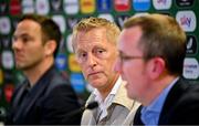 11 July 2024; Newly appointed Republic of Ireland head coach Heimir Hallgrímsson, centre, with FAI director of football Marc Canham, left, and FAI interim chief executive David Courell, right, during a media conference at the Aviva Stadium in Dublin. Photo by Seb Daly/Sportsfile