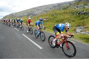 11 July 2024; Matthew Walls of Cycling Leinster team leads the peloton during stage three of the 2024 Junior Tour of Ireland at the Burren stage in Clare. Photo by Stephen McMahon/Sportsfile