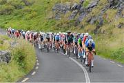 11 July 2024; Matthew Walls of Cycling Leinster leads the peloton during stage three of the 2024 Junior Tour of Ireland at the Burren stage in Clare. Photo by Stephen McMahon/Sportsfile