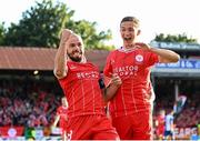 11 July 2024; Mark Coyle of Shelbourne, left, celebrates with team-mate Tyreke Wilson after scoring his side's first goal during the UEFA Conference League first qualifying round first leg match between Shelbourne and St Joseph's FC at Tolka Park in Dublin. Photo by Harry Murphy/Sportsfile