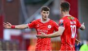 11 July 2024; Will Jarvis of Shelbourne celebrates with team-mate John Martin after scoring his side's second goal during the UEFA Europa Conference League first qualifying round first leg match between Shelbourne and St Joseph's FC at Tolka Park in Dublin. Photo by Seb Daly/Sportsfile