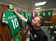 12 July 2024; Republic of Ireland equipment officer Barry Sanfey prepares the jersey of Republic of Ireland captain Denise O'Sullivan in the dressing room before the 2025 UEFA Women's European Championship qualifying group A match between England and Republic of Ireland at Carrow Road in Norwich, England. Photo by Stephen McCarthy/Sportsfile