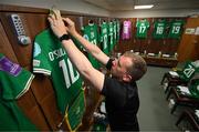 12 July 2024; Republic of Ireland equipment officer Barry Sanfey prepares the jersey of Republic of Ireland captain Denise O'Sullivan in the dressing room before the 2025 UEFA Women's European Championship qualifying group A match between England and Republic of Ireland at Carrow Road in Norwich, England. Photo by Stephen McCarthy/Sportsfile