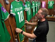 12 July 2024; Republic of Ireland equipment officer Barry Sanfey prepares the jersey of Republic of Ireland captain Denise O'Sullivan in the dressing room before the 2025 UEFA Women's European Championship qualifying group A match between England and Republic of Ireland at Carrow Road in Norwich, England. Photo by Stephen McCarthy/Sportsfile