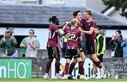 12 July 2024; Patrick Hickey of Galway United, second from right, celebrates with team-mates, from left, Jeannot Esua, Conor McCormack and Robert Slevin after scoring their side's first goal during the SSE Airtricity Men's Premier Division match between Galway United and Waterford at Eamonn Deacy Park in Galway. Photo by Piaras Ó Mídheach/Sportsfile