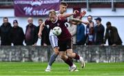 12 July 2024; Stephen Walsh of Galway United in action against Kacper Radkowski of Waterford during the SSE Airtricity Men's Premier Division match between Galway United and Waterford at Eamonn Deacy Park in Galway. Photo by Piaras Ó Mídheach/Sportsfile