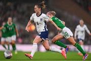 12 July 2024; Keira Walsh of England in action against Denise O'Sullivan of Republic of Ireland during the 2025 UEFA Women's European Championship qualifying group A match between England and Republic of Ireland at Carrow Road in Norwich, England. Photo by Stephen McCarthy/Sportsfile