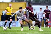 12 July 2024; Grant Horton of Waterford in action against Francely Lomboto of Galway United during the SSE Airtricity Men's Premier Division match between Galway United and Waterford at Eamonn Deacy Park in Galway. Photo by Piaras Ó Mídheach/Sportsfile