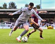 12 July 2024; Robbie McCourt of Waterford in action against Edward McCarthy of Galway United during the SSE Airtricity Men's Premier Division match between Galway United and Waterford at Eamonn Deacy Park in Galway. Photo by Piaras Ó Mídheach/Sportsfile