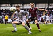 12 July 2024; Dean McMenamy of Waterford in action against Conor McCormack of Galway United  during the SSE Airtricity Men's Premier Division match between Galway United and Waterford at Eamonn Deacy Park in Galway. Photo by Piaras Ó Mídheach/Sportsfile