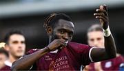 12 July 2024; Jeannot Esua of Galway United kisses the Galway United crest as he celebrates after his side's victory in the SSE Airtricity Men's Premier Division match between Galway United and Waterford at Eamonn Deacy Park in Galway. Photo by Piaras Ó Mídheach/Sportsfile