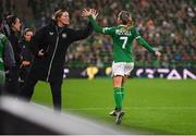 12 July 2024; Julie-Ann Russell of Republic of Ireland celebrates with Republic of Ireland assistant coach Emma Byrne after scoring her side's first goal during the 2025 UEFA Women's European Championship qualifying group A match between England and Republic of Ireland at Carrow Road in Norwich, England. Photo by Stephen McCarthy/Sportsfile