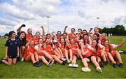 13 July 2024; Armagh players celebrate with the cup after the LGFA All-Ireland U16 B Championship final match between Armagh and Waterford at Kinnegad GAA in Westmeath. Photo by Ben McShane/Sportsfile