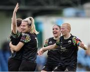 13 July 2024; Delana Friesen of Treaty United, left, celebrates scoring her side's first goal with teammates, from left, Katie Lawlee, Leah Martin, and Erin van Dolder during the SSE Airtricity Women's Premier Division match between DLR Waves and Treaty United at UCD Bowl in Belfield, Dublin. Photo by Thomas Flinkow/Sportsfile