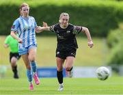 13 July 2024; Danielle Steer of Treaty United in action against Chloe McCarthy of DLR Waves during the SSE Airtricity Women's Premier Division match between DLR Waves and Treaty United at UCD Bowl in Belfield, Dublin. Photo by Thomas Flinkow/Sportsfile