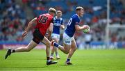 13 July 2024; Niall Dunne of Laois in action against Paddy McCarthy of Down during the Tailteann Cup Final match between Down and Laois at Croke Park in Dublin. Photo by Ray McManus/Sportsfile