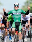 13 July 2024; Max Fitzgerald of Cycling Ireland team celebrates after winning stage five of the 2024 Junior Tour of Ireland at the East Clare stage in Clare. Photo by Stephen McMahon/Sportsfile