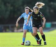 13 July 2024; Katie Lawlee of Treaty United  feels pressure from Rachel Doyle of DLR Waves during the SSE Airtricity Women's Premier Division match between DLR Waves and Treaty United at UCD Bowl in Belfield, Dublin. Photo by Thomas Flinkow/Sportsfile