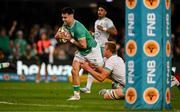 13 July 2024; Conor Murray of Ireland scores his side's first try despite the attentions of Pieter-Steph du Toit of South Africa during the second test between South Africa and Ireland at Kings Park in Durban, South Africa. Photo by Brendan Moran/Sportsfile