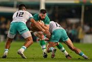 13 July 2024; Robbie Henshaw of Ireland is tackled by Damian de Allende, left, and Jesse Kriel of South Africa during the second test between South Africa and Ireland at Kings Park in Durban, South Africa. Photo by Brendan Moran/Sportsfile