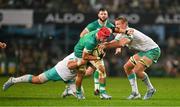 13 July 2024; Josh van der Flier of Ireland is tackled by Frans Malherbe and Pieter-Steph du Toit of South Africa during the second test between South Africa and Ireland at Kings Park in Durban, South Africa. Photo by Brendan Moran/Sportsfile