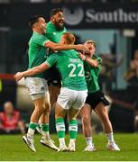 13 July 2024; Ciarán Frawley of Ireland, right, celebrates with teammates Conor Murray, Bundee Aki and Craig Casey after kicking their side's winning drop goal in the last seconds of the second test between South Africa and Ireland at Kings Park in Durban, South Africa. Photo by Brendan Moran/Sportsfile