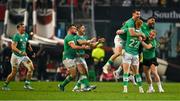 13 July 2024; Ciarán Frawley of Ireland, 22, celebrates with teammates Conor Murray, Bundee Aki and Craig Casey after kicking their side's winning drop goal in the last seconds of the second test between South Africa and Ireland at Kings Park in Durban, South Africa. Photo by Brendan Moran/Sportsfile
