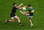 13 July 2024; Paudie Clifford of Kerry has his shot blocked by Rory Grugan of Armagh during the GAA Football All-Ireland Senior Championship semi-final match between Armagh and Kerry at Croke Park in Dublin. Photo by Daire Brennan/Sportsfile