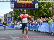 14 July 2024; Hugh Armstrong of Ballina AC, Mayo, crosses the line to win the Irish Life Dublin Race Series Fingal 10k at Swords in Dublin. Photo by Sam Barnes/Sportsfile