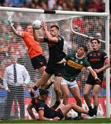 13 July 2024; Rian O'Neill of Armagh catches a late ball into the square ahead of teammate and goalkeeper Blaine Hughes, left, and Kerry's David Clifford during the GAA Football All-Ireland Senior Championship semi-final match between Armagh and Kerry at Croke Park in Dublin. Photo by Seb Daly/Sportsfile