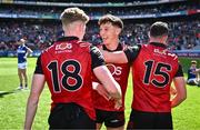13 July 2024; Pierce Laverty of Down, centre, celebrates with team-mates Paddy McCarthy, 18, and Conor McCrickard, 15, after their side's victory in the Tailteann Cup Final match between Down and Laois at Croke Park in Dublin. Photo by Piaras Ó Mídheach/Sportsfile