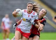 14 July 2024; Aoibhinn McHugh of Tyrone in action against Erin Sands of Down during the TG4 All-Ireland Intermediate Championship semi-final match between Down and Tyrone at St Tiernach's Park in Clones, Monaghan. Photo by Oliver McVeigh/Sportsfile