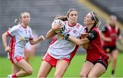 14 July 2024; Aoibhinn McHugh of Tyrone in action against Erin Sands of Down during the TG4 All-Ireland Intermediate Championship semi-final match between Down and Tyrone at St Tiernach's Park in Clones, Monaghan. Photo by Oliver McVeigh/Sportsfile