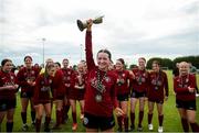 14 July 2024; Athenry captain Kerri O'Driscoll lifts the cup after the FAI Women's Under 17 Cup final match between Athenry and Killester Donnycarney FC at Mullingar Athletic FC in Gainstown, Westmeath. Photo by Michael P Ryan/Sportsfile