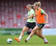 14 July 2024; Izzy Atkinson, left, and Megan Connolly during a Republic of Ireland women's training session at Turners Cross in Cork Photo by Stephen McCarthy/Sportsfile