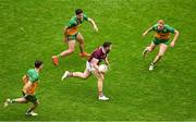 14 July 2024; Damien Comer of Galway in action against Donegal players, left to right, Niall O Donnell, Brendan McCole, and Oisin Gallen during the GAA Football All-Ireland Senior Championship semi-final match between Donegal and Galway at Croke Park in Dublin. Photo by Daire Brennan/Sportsfile