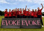 14 July 2024; Dragons captain Arlene Kelly celebrates with teammates after the Evoke Super 20 Trophy Super Series match between Scorchers and Dragons at Malahide Cricket Ground in Dublin. Photo by Tom Beary/Sportsfile