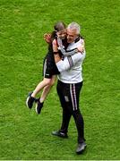 14 July 2024; Galway manager Pádraic Joyce celebrates with his daughter Jodie, aged 6, after the GAA Football All-Ireland Senior Championship semi-final match between Donegal and Galway at Croke Park in Dublin. Photo by Daire Brennan/Sportsfile