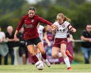 14 July 2024; Kerri O'Driscoll of Athenry in action against Drew Hendrick of Killester Donnycarney FC during the FAI Women's Under 17 Cup final match between Athenry and Killester Donnycarney FC at Mullingar Athletic FC in Gainstown, Westmeath. Photo by Michael P Ryan/Sportsfile