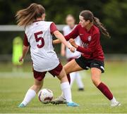 14 July 2024; Kerri O'Driscoll of Athenry in action against Jessica White of Killester Donnycarney FC during the FAI Women's Under 17 Cup final match between Athenry and Killester Donnycarney FC at Mullingar Athletic FC in Gainstown, Westmeath. Photo by Michael P Ryan/Sportsfile