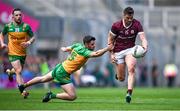 14 July 2024; Shane Walsh of Galway evades the tackle of Donegal's Ryan McHugh during the GAA Football All-Ireland Senior Championship semi-final match between Donegal and Galway at Croke Park in Dublin. Photo by Seb Daly/Sportsfile