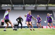 15 July 2024; Players, from left, Eva Mangan, Ruesha Littlejohn, Abbie Larkin and Lily Agg with assistant coach Colin Healy during a Republic of Ireland women's training session at Páirc Uí Chaoimh in Cork. Photo by Stephen McCarthy/Sportsfile