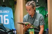 16 July 2024; Lily Agg of Republic of Ireland reads the match programme in the dressing room before the 2025 UEFA Women's European Championship qualifying group A match between Republic of Ireland and France at Páirc Uí Chaoimh in Cork. Photo by Stephen McCarthy/Sportsfile