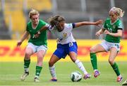 16 July 2024; Selma Bacha of France is tackled by Aoife Mannion, left, and Denise O'Sullivan of Republic of Ireland during the 2025 UEFA Women's European Championship qualifying group A match between Republic of Ireland and France at Páirc Uí Chaoimh in Cork. Photo by Stephen McCarthy/Sportsfile