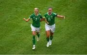 16 July 2024; Julie-Ann Russell of Republic of Ireland, left, celebrates with teammate Katie McCabe after scoring their side's second goal during the 2025 UEFA Women's European Championship qualifying group A match between Republic of Ireland and France at Páirc Uí Chaoimh in Cork. Photo by Shauna Clinton/Sportsfile