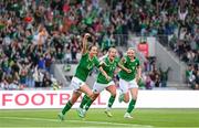 16 July 2024; Anna Patten of Republic of Ireland celebrates with teammates Louise Quinn and Lily Agg, after scoring their side's third goal during the 2025 UEFA Women's European Championship qualifying group A match between Republic of Ireland and France at Páirc Uí Chaoimh in Cork. Photo by Stephen McCarthy/Sportsfile