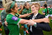 16 July 2024; Republic of Ireland head coach Eileen Gleeson, right, and Julie-Ann Russell celebrate after the 2025 UEFA Women's European Championship qualifying group A match between Republic of Ireland and France at Páirc Uí Chaoimh in Cork. Photo by Stephen McCarthy/Sportsfile